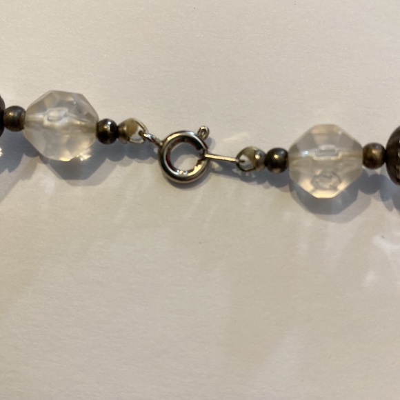 Acrylic faceted clear beads with silver color spacers strung on string c clasp - Picture 3 of 3